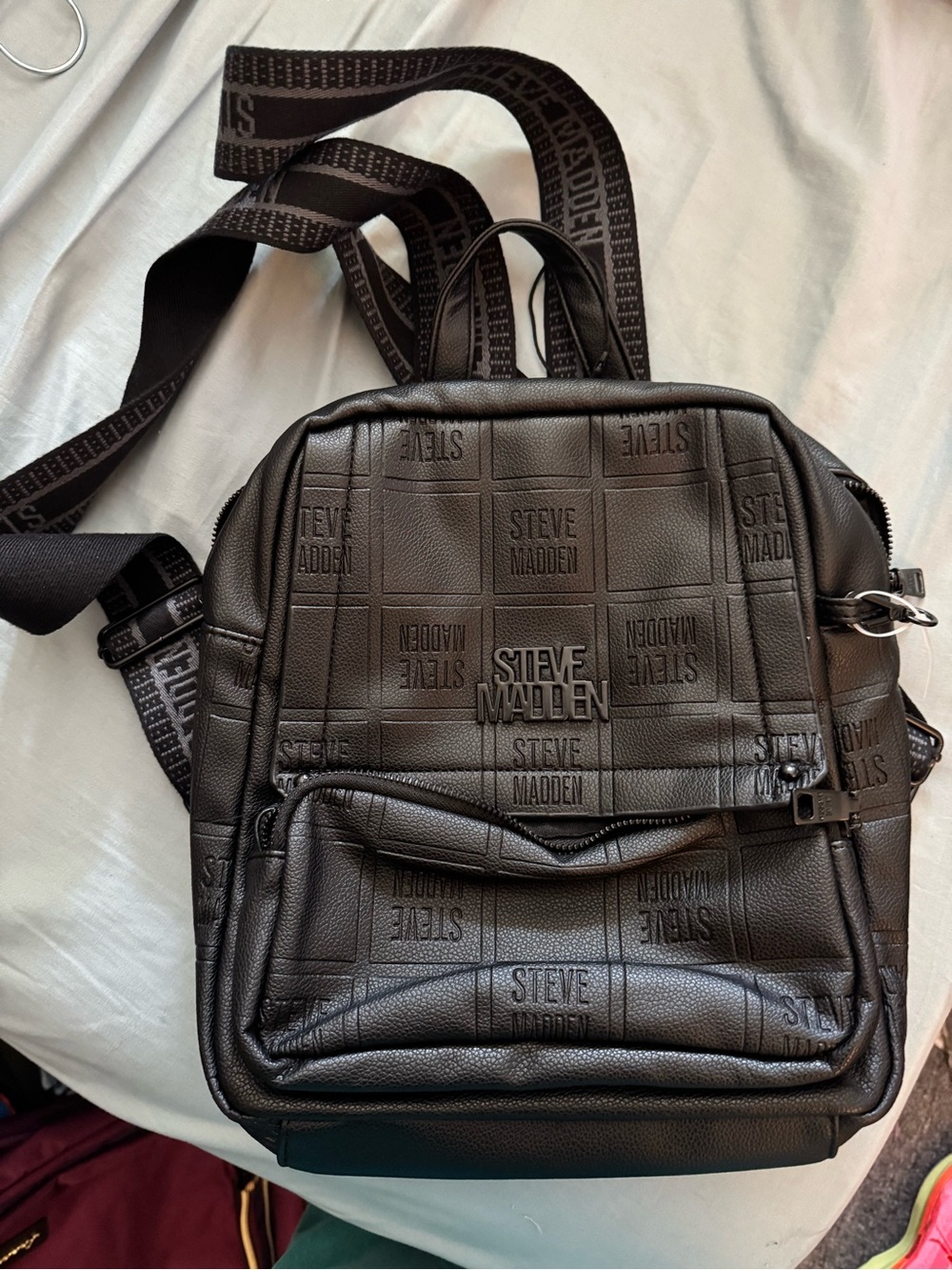 Steve Madden Black Embossed Logo Backpack